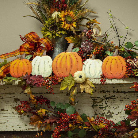 Pumpkins in a Row by The Round Top Collection
