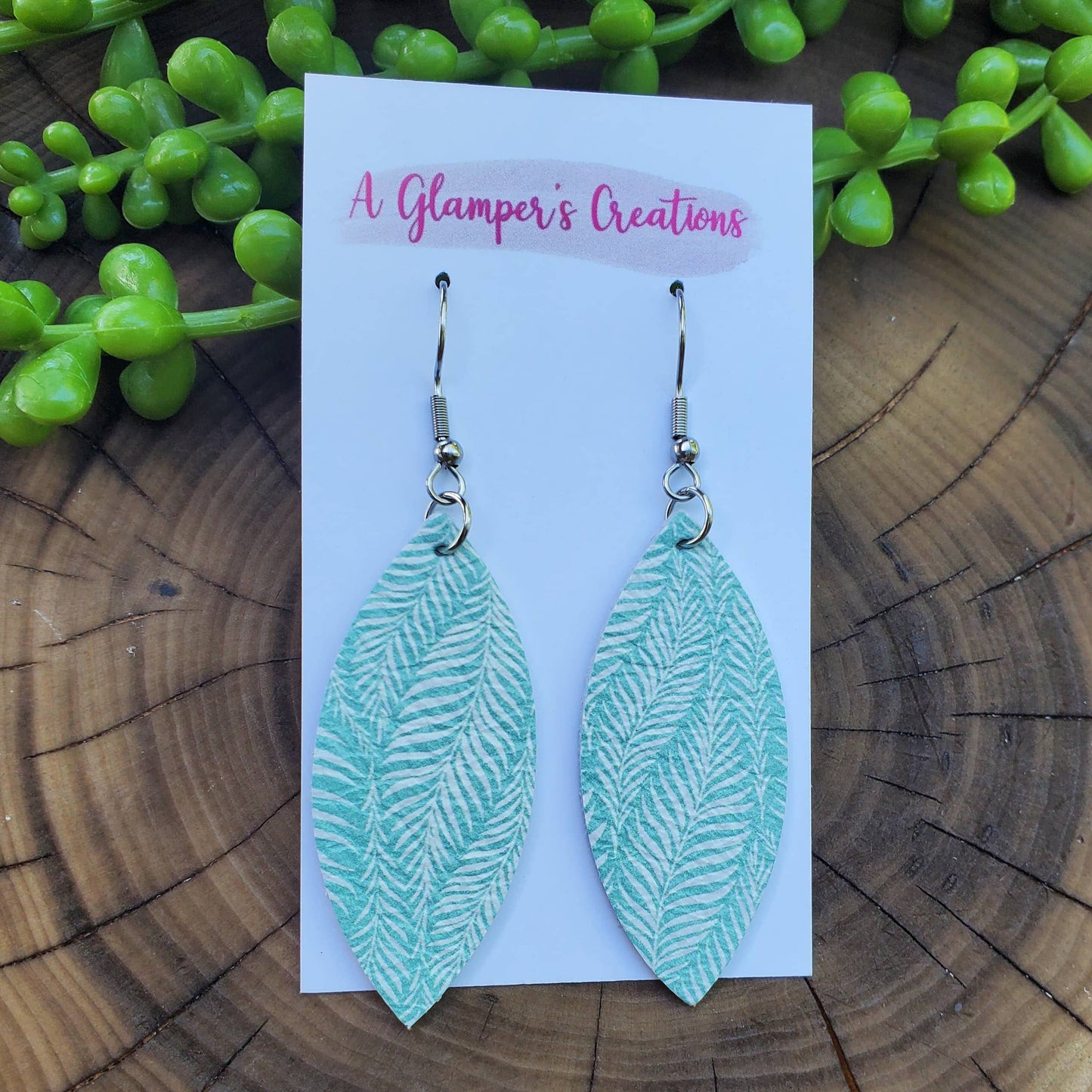 White Palm Leaves on Mint Pointed Oval Leather Earrings